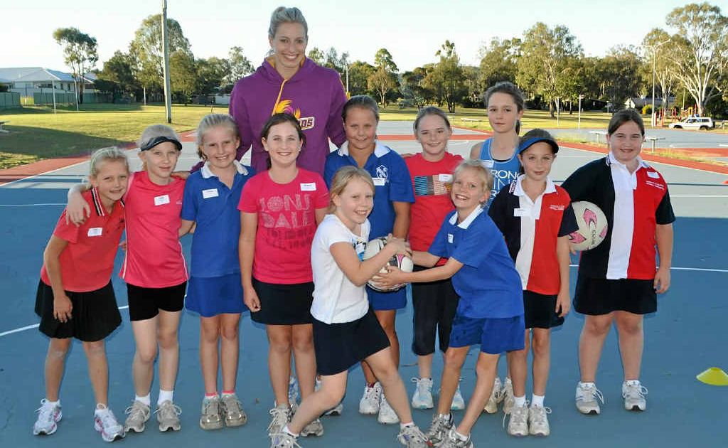 (back) Stacey Simpson, Holly Naughton, Larissa Vickers, Brianna Gross, Maddison Jackson, Emily Lyons, Abigail Schoorl, Katelyn Garton, Xanthe Esson, (front) Ashleigh McLean and Sophie Follett take some netball pointers from professional player Laura Geitz. (back) Stacey Simpson, Holly Naughton, Larissa Vickers, Brianna Gross, Maddison Jackson, Emily Lyons, Abigail Schoorl, Katelyn Garton, Xanthe Esson, (front) Ashleigh McLean and Sophie Follett take some netball pointers from professional player Laura Geitz.